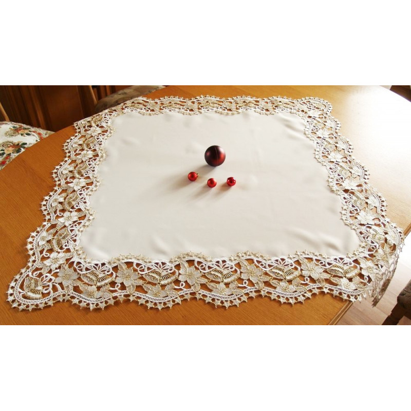 Quadratischer Tischläufer aus crèmefarbenem Mako-Satin mit edler Plauener Spitze und weihnachtlichem Glocken-Stickmuster.