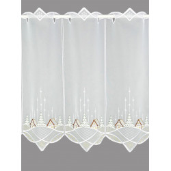 Halbtransparente weiße Scheibengardine aus Voile mit Wintermotiv und spitz zulaufendem Abschluss.