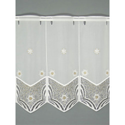 Halbtransparenter Sichtschutz aus Plauener Spitze mit Schneeflocken-Motiven und feiner Goldstickerei.