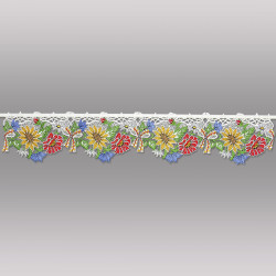 Plauener Spitzengardine mit gestickten, gelben Sonnenblumen für ein freundliches Fenster-Ambiente.