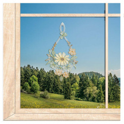 Filigranes Frühlings-Fensterbild mit einer zarten Margeriten-Ranke im sonnigen Garten-Ambiente am Fenster.