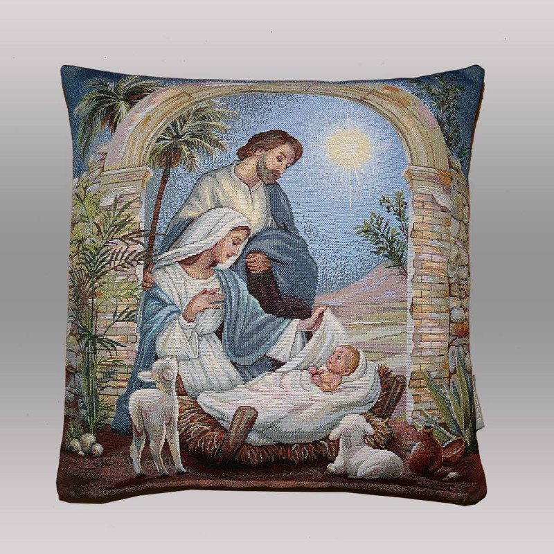 Kissenhülle mit christlichem Weihnachtsmotiv aus festem Gobelinstoff, freigestellt vor grauem Hintergrund.