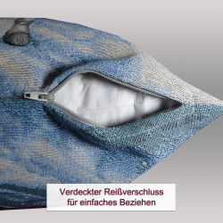 Geöffneter verdeckter Reißverschluss an der Unterseite des Dekokissens für einfaches Beziehen der Heimtextilien.