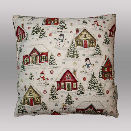 Weihnachtliches Dekokissen aus Gobelin mit bunten Winterhäusern auf grauem Hintergrund.