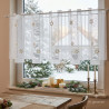 Weihnachts-Scheibengardine aus Plauener Spitze mit Goldsternen stilvoll dekoriert im Esszimmer.
