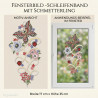 Besticktes Heimtextilien-Fensterbild mit rotem Schmetterling, weißer Anemone, geschwungenem Schleifenband und Marienkäfern im Fenster.