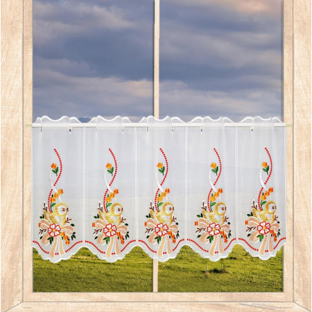 Weiße Plauener Spitze Kurzgardine mit gelben Küken, orangefarbenen Schleifen und Blumen im Fenster